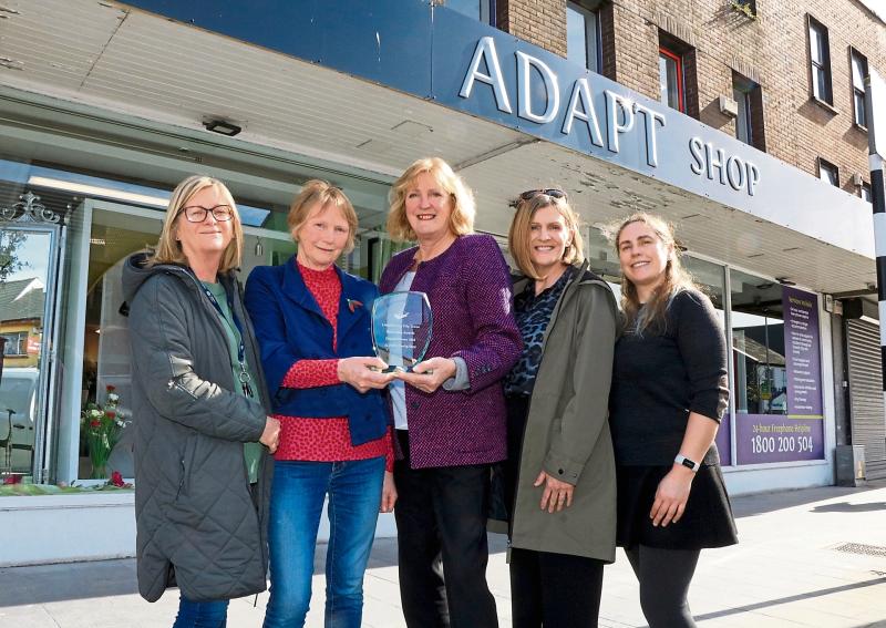 Charity shop volunteers celebrate Tidy Towns Limerick victory