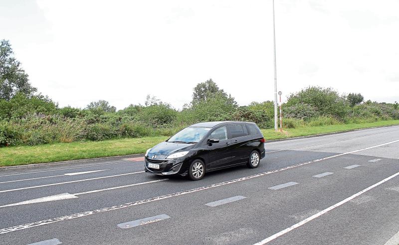 A main road  into Limerick city has a transport priority lane - but no buses to serve it