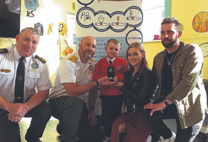 Brave Limerick boy receives medal for helping his mother in medical emergency
