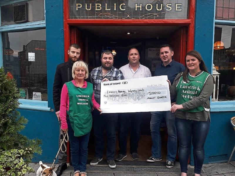 The Market Quarter presented €5,000 to Limerick Animal Welfare after a golf tournament