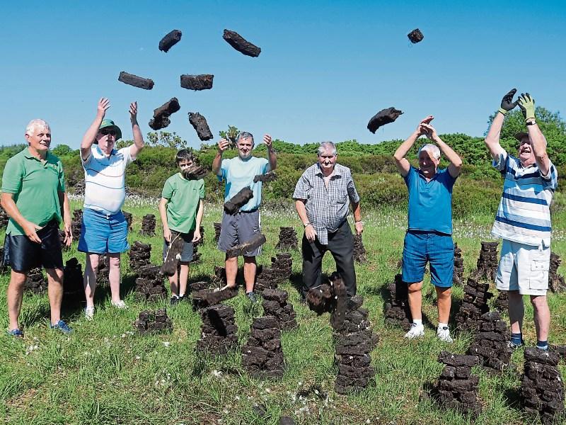 Billy Connolly, Donough Moynihan, Bobby Greene, Robbie Greene, John Lynch, Marty Collins and Seamus Moynihan are pictured in Annaholty bog Picture: Michael Cowhey