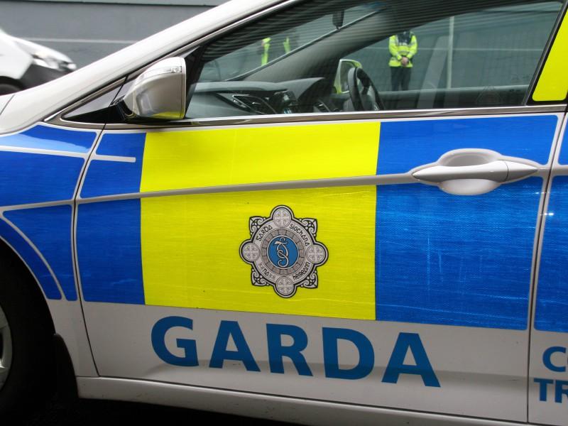 Gardai at scene of double car crash at County Limerick crossroad
