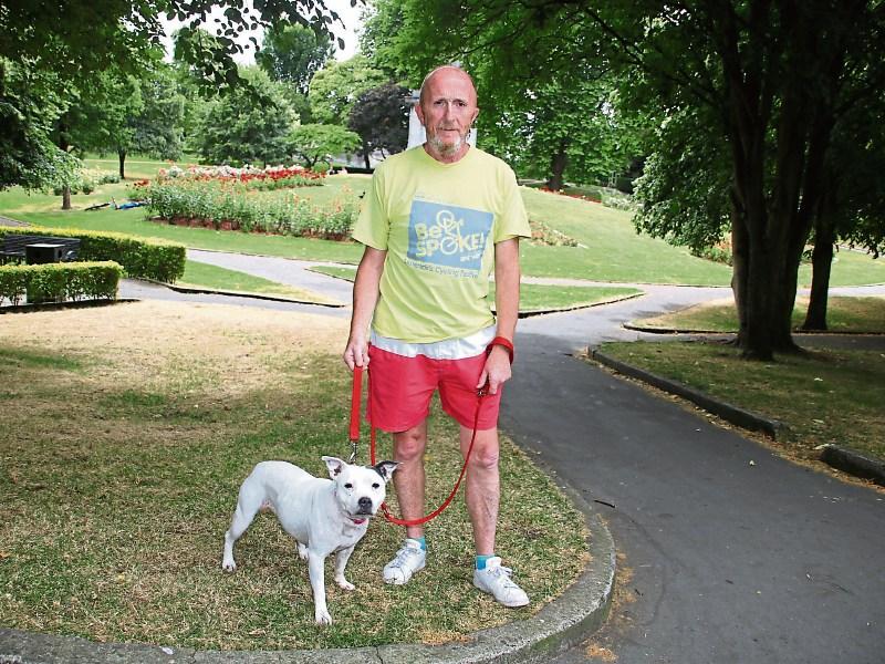 Cllr John Loftus, with his dog Daphne, who he walks every day through the People’s Park Picture: Adrian Butler