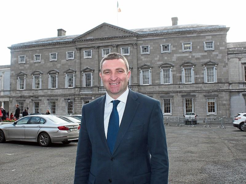 Deputy Niall Collins and, below, the front page of the Limerick Leader on May 20, 2017