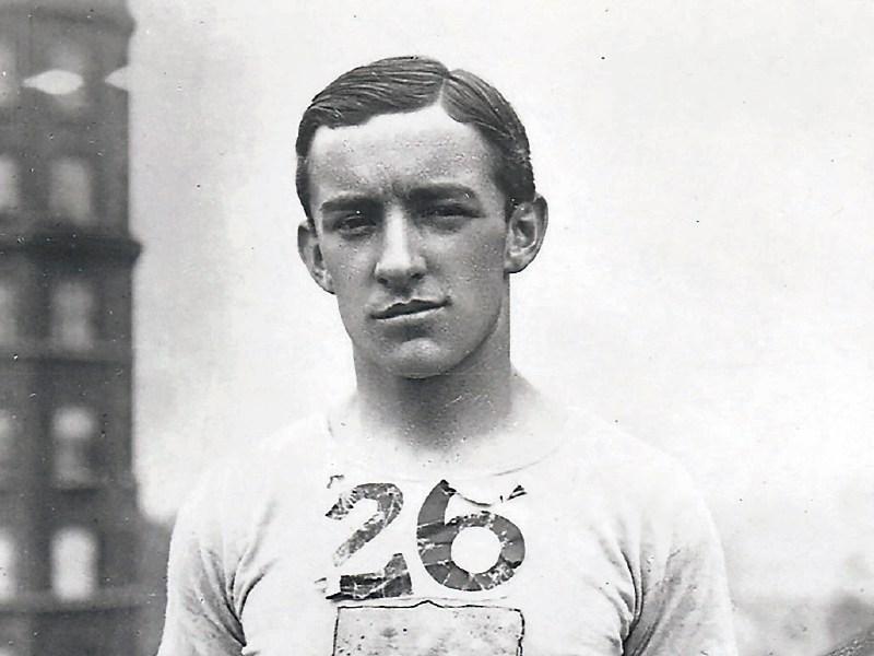 Johnny Hayes wearing his lucky number 26 on his team uniform during the 1908 Olympics