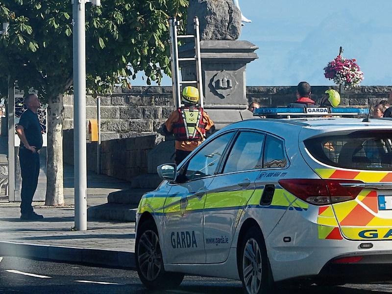 Limerick emergency services assisting woman on top of the Treaty Stone