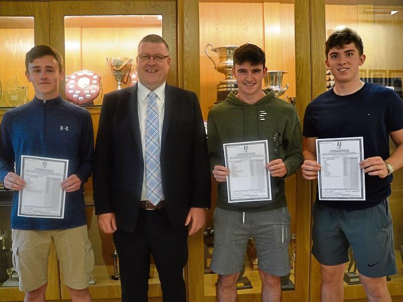 Ardscoil Rís principal Tom Prendergast,  with Eoin Corcoran, Ronan Connolly and Michael O'Callaghan