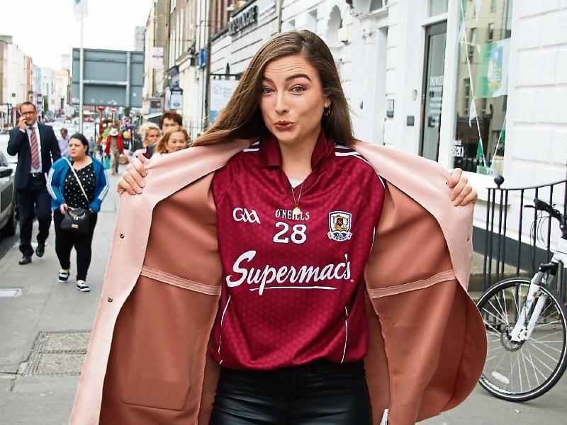 Meghann Scully, columnist with our free paper The Leader and Spin South West DJ, braved O’Connell Street in the Galway jersey Picture: Adrian Butler
