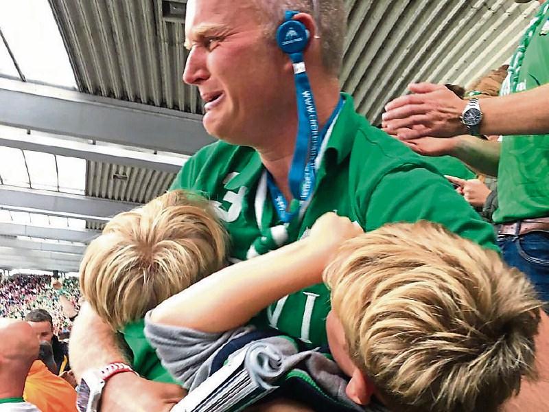 At last! Darragh Moloney, Knockaderry, holds on tight to his sons &ndash; Cillian, aged 10, and R&iacute;an, 8 &ndash; at the final whistle in Croke Park
