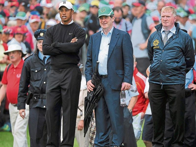 Tiger Woods with JP McManus accompanied by Gardai on the first tee box during the Pro Am at Adare Manor Hotel and Golf Resort in 2010