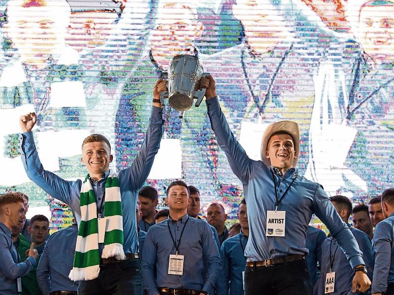 Brothers Peter Casey, left, and Mike Casey from Na Piarsaigh GAA club celebrate with the Liam MacCarthy Cup at the homecoming Picture: Diarmuid Greene/Sportsfile