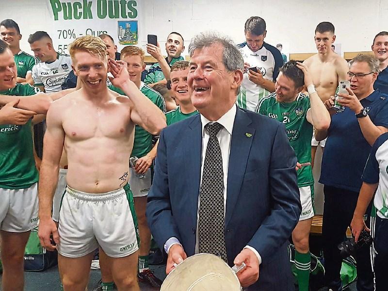 Welcome to paradise: JP McManus in the victorious Limerick dressing-room at Croke Park on Sunday, after the unforgettable win against Galway