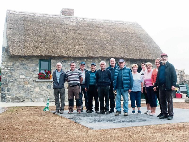 Men and women of the Newtown Cottage Association who rolled up their sleeves and used their talent to reconstruct a hedge school in Clarina              Picture: Michael Cowhey