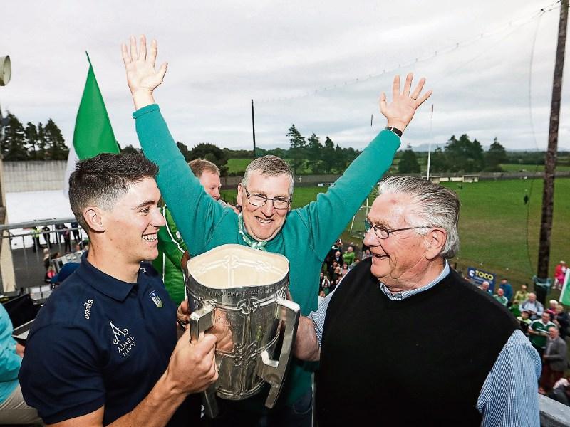 Sean Finn, his Dad Brian and cousin Dickie with the Liam MacCarthy Cup in Bruff Picture: Keith Wiseman