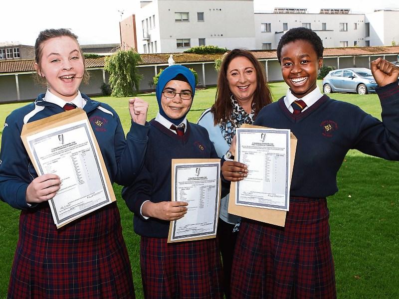 Art Teacher Sarah Nestor with Abbey O'Keeffe, Zohra Koohestani and Nancy Ekhator who got their Junior Certificate exam results at Coláiste Nano NaglePicture: Dave Gaynor