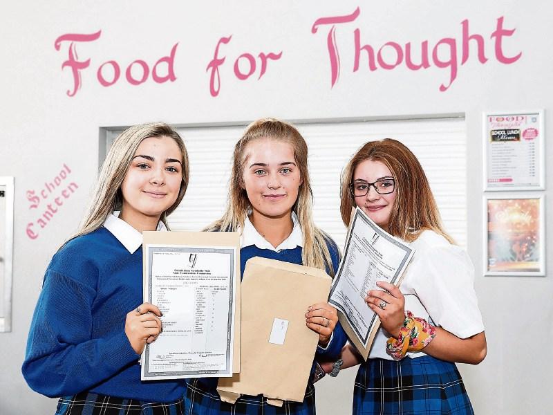 Food for thought: Lucy Lyons, Bulgaden, Miriam Higgins, Kilmallock and Jasmine Ahern, Dromin, opened the results of their Junior Certificate exam at Colaiste Iosaef, Kilmallock Picture: Keith Wiseman