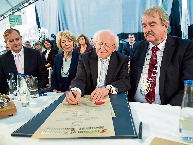The incumbent President Michael D Higgins receiving the Freedom of Limerick in 2014. He is pictured alongside wife Sabina, the then Mayor, Cllr Kevin Sheahan, and council chief executive Conn Murray
