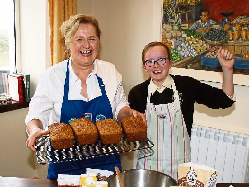 Bláithín Herbert with her niece, Faye, in the kitchen Picture: Adrian Butler