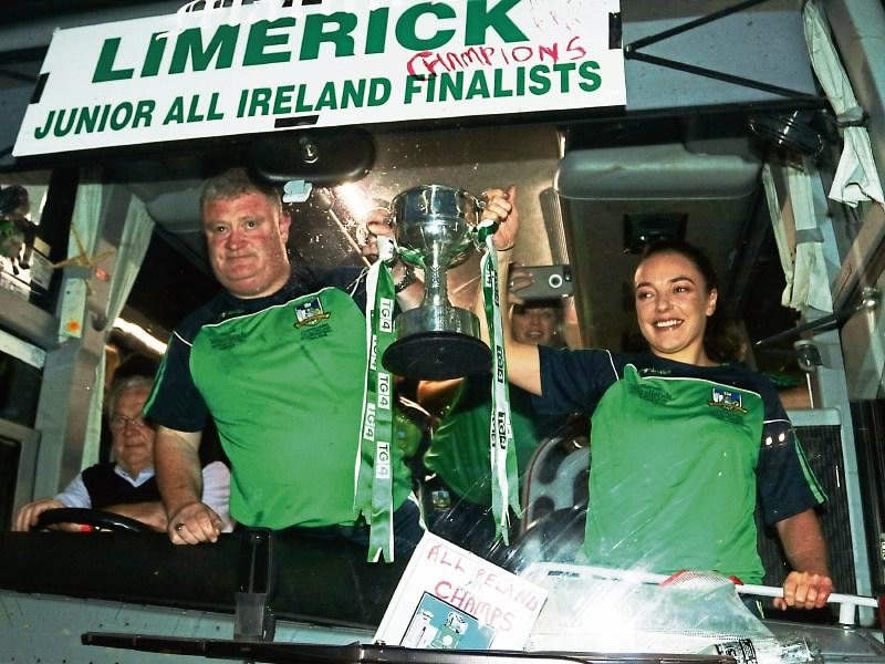 John Ryan and the captain of the Limerick leadies, Cathy Mee arriving with the West County Hotel Cup at the Woodlands Hotel Picture: Brendan Gleeson