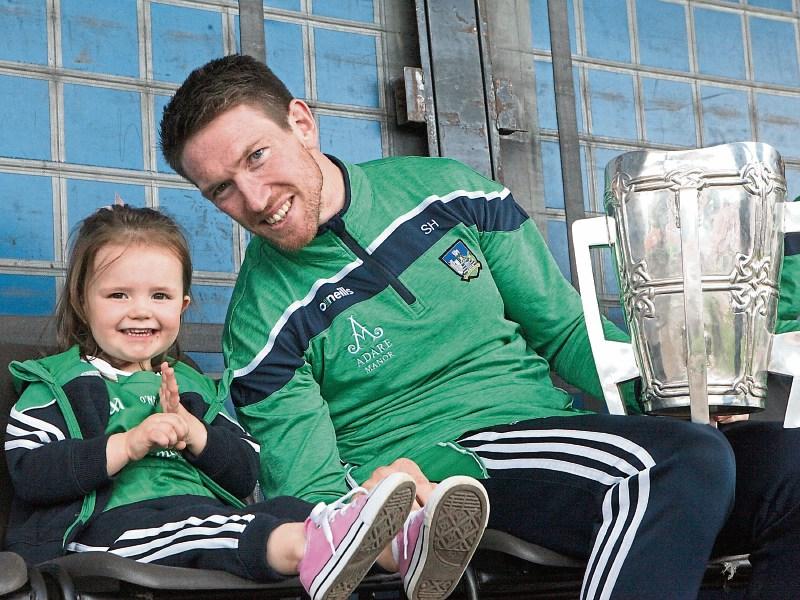Anna Hickey, who celebrated her third birthday last week, with her dad Seamus, who brought the Liam MacCarthy Cup home to Murroe-Boher GAA Club Picture: Dave Gaynor 