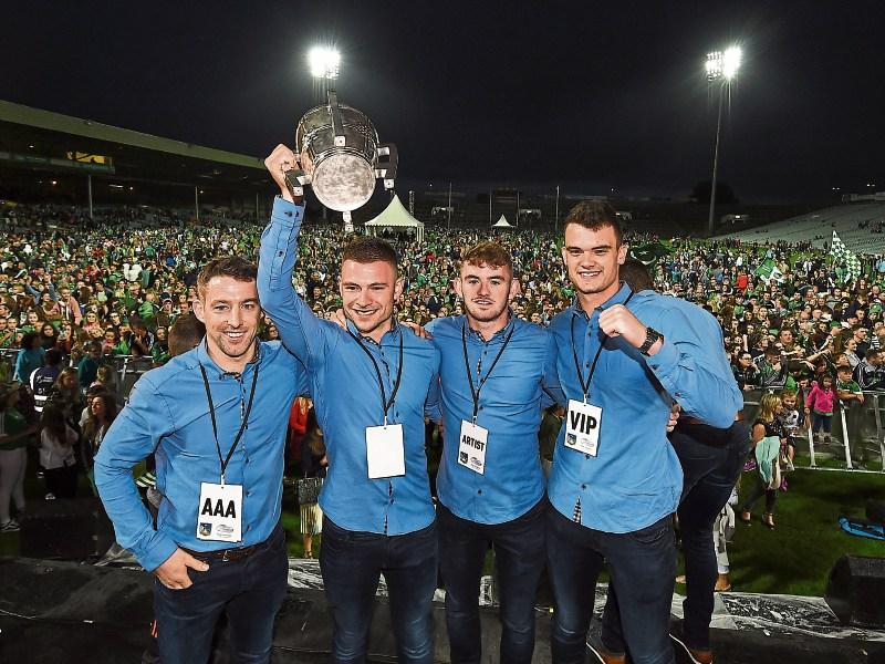 Limerick sub goalkeeper Barry Hennessy, (holding cup) with his Kilmallock teammates Graeme Mulcahy, Oisin O’Reilly, and Paddy O’Loughlin at the homecoming Picture: Sportsfile
