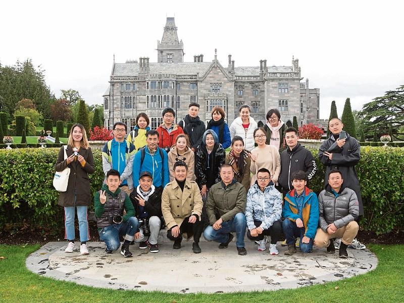 Chinese TV star Ren Zhong (front, third left) with photographers and crew, during filming at Adare Manor Picture: Liam Burke / Press 22