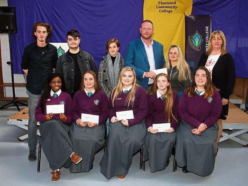 David Greaney and Thomond Community College principal Norma O’Brien with the senior group of scholarship recipients Picture: Adrian Butler