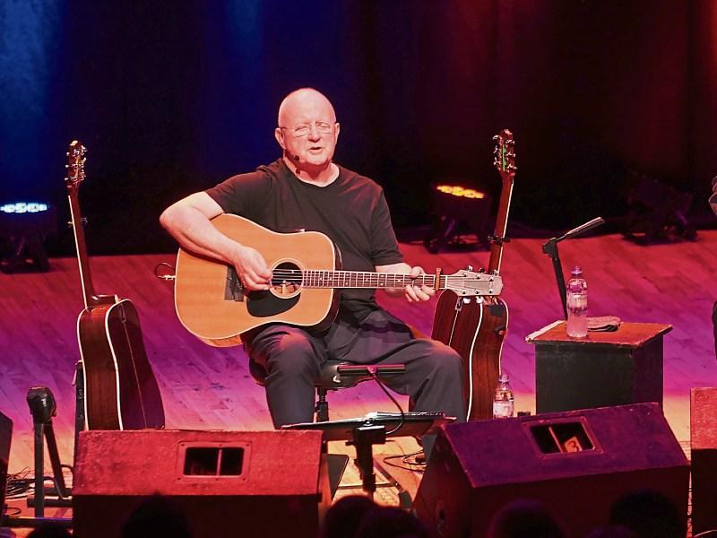 Christy Moore performing in the UCH, where he returns in April 2019