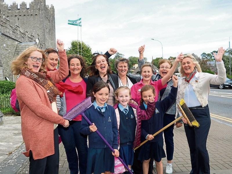 Patrons and staff from the Heritage Centre give a big cheer for Adare  Picture: Michael Cowhey