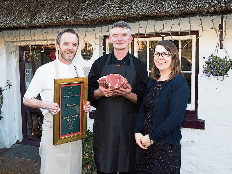 Wade and Elaine Murphy of 1826 Adare, pictured with butcher Garrett Landers last year