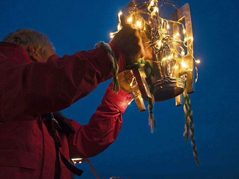 The illuminated Liam MacCarthy Cup and below, some of those taking part
