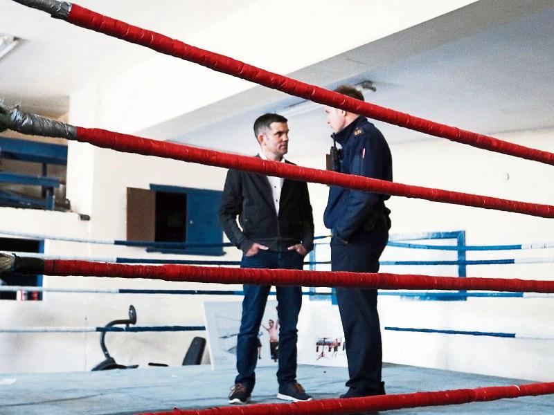 In the ring: Bernard Dunne speaking to Garda Mike Fitzgerald at St Munchin’s Boxing Club Picture: Brendan Gleeson