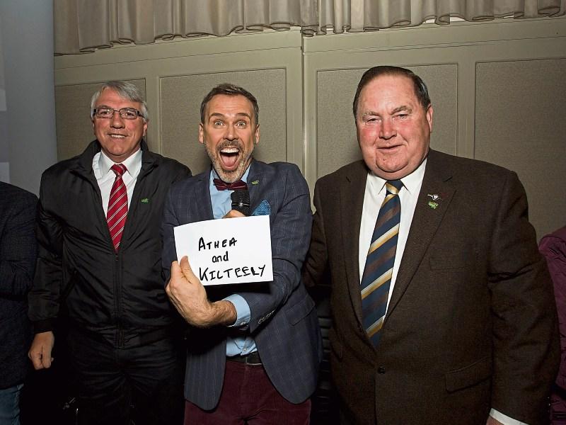 Going for Gold MC Richard Lynch is flanked by Henry Moran of Athea and John McCarthy, Kilteely as he announces the result Picture: Alan Place
