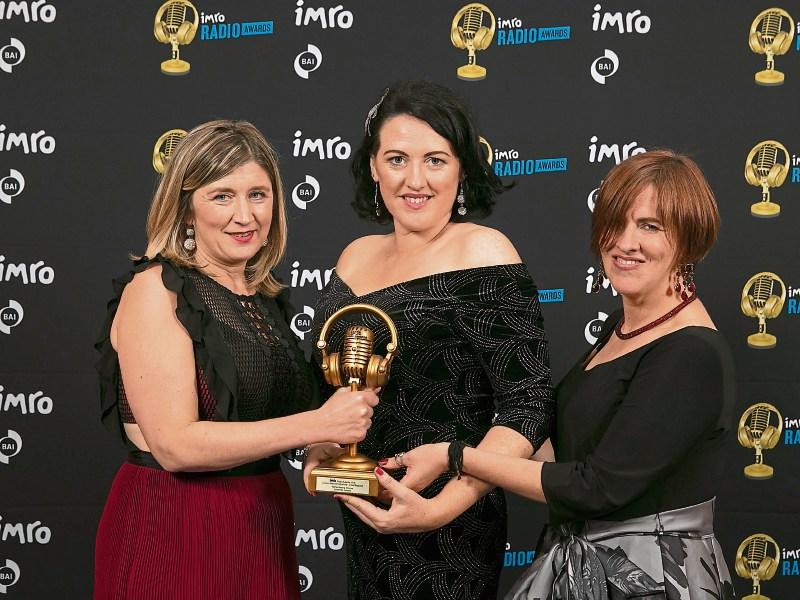 Remembering Dolores: Gillian Devlin and Anne Marie Geraghty of Live 95FM accept the award from Eleanor McEvoy, chairman of IMRO