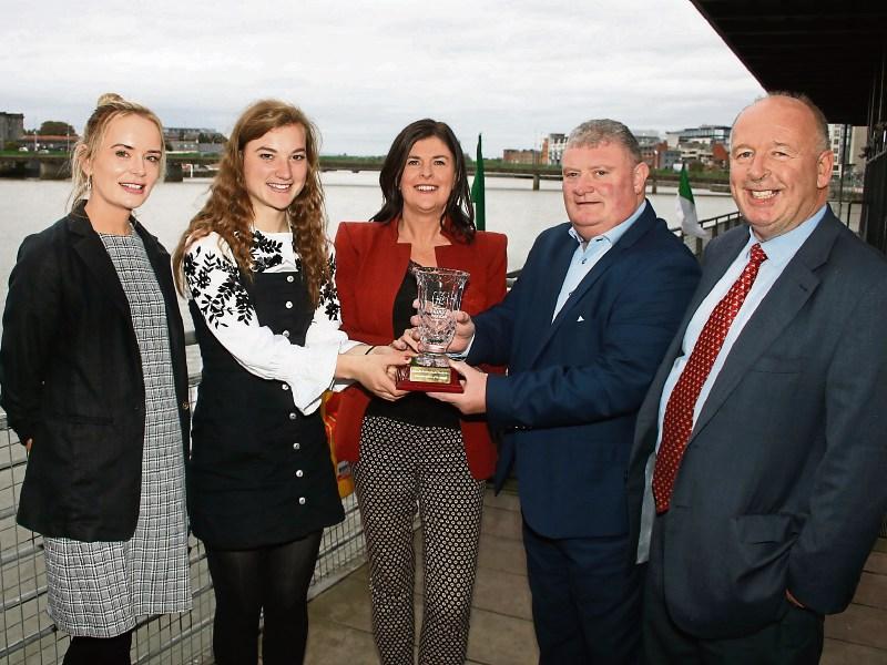 Caroline Hickey and John Ryan of the Limerick ladies junior football team accept the award from Mary O'Riordan, Southern, Elaine Ryan, Clayton hotel and Eugene Phelan, editor, Limerick Leader
