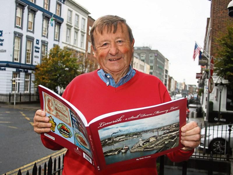 A strol down memory lane: Sean Curtin with his book and below, some of the pictures