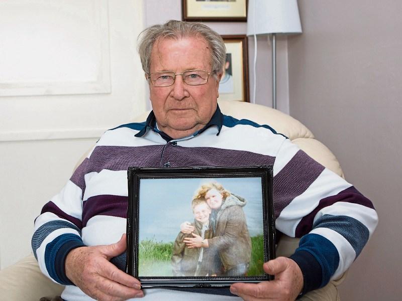 Bob Shanahan with a picture of Gussie and his late wife Nancy. His son will be laid to rest this Saturday