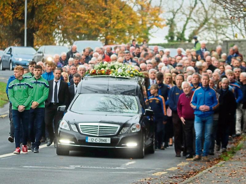 The village of Patrickswell came to a standstill as the local community paid a final tribute to All-Star hurler Leonard Enright Picture: Michael Cowhey