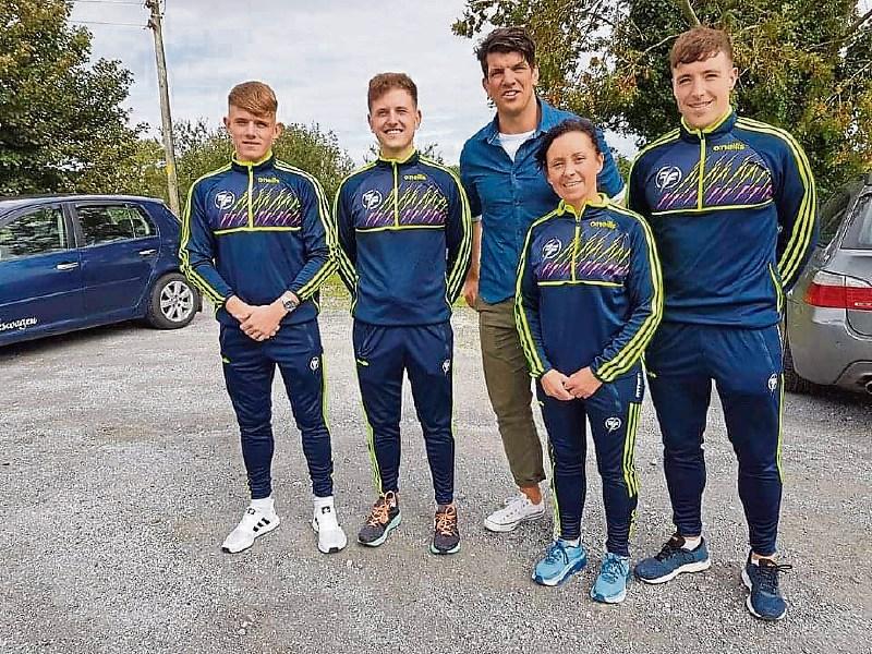 Coach Donncha O'Callaghan pictured with the Lawlor family Shanagolden as they compete for the title Ireland's Fittest Family 