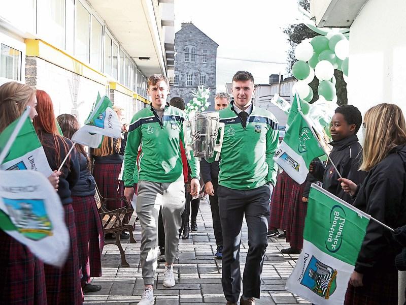 Limerick senior hurlers were greeted by Coláiste Nano Nagle students when they arrived at the school with the Liam McCarthy Cup Picture: Dave Gaynor