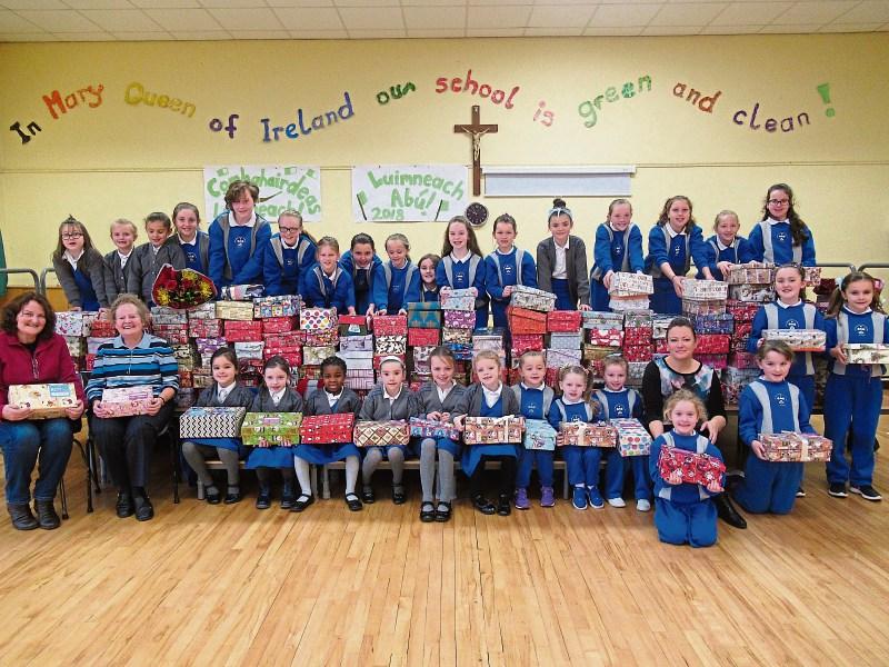 Mary Queen of Ireland pupils with their local hero Sigi Murrihy