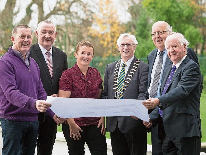 Pictured at the contract signing were Terence O’Brien, Pat Dowling, Carmel Kirby, Councillor Michael Begley, Councillor Richard Nagle and Councillor Gabriel Keating Picture: Eamon Ward