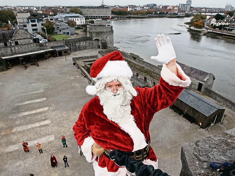 Santa scales the walls of King John’s Castle in Limerick ahead of a magical Christmas adventure at the medieval structure Picture: Sean Curtin/True Media