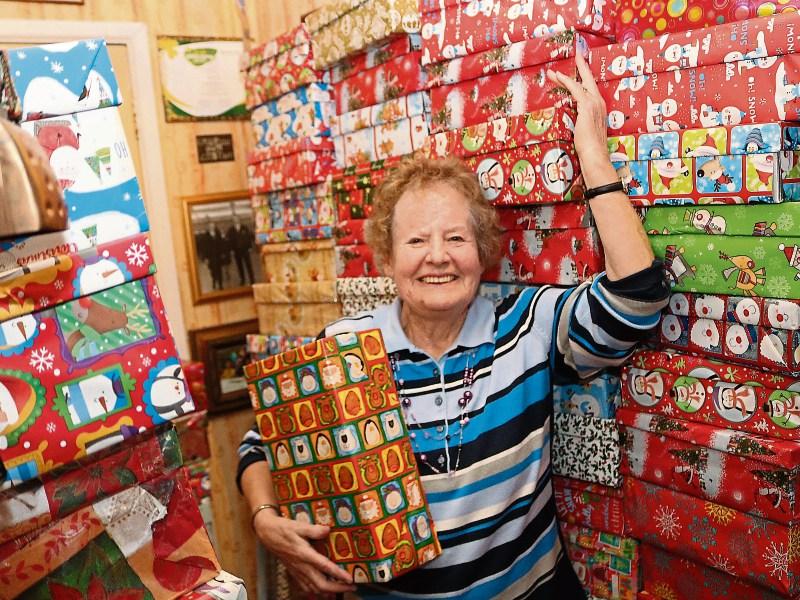 Sigi Murrihy with some of her Christmas shoeboxes Picture: Michael Cowhey