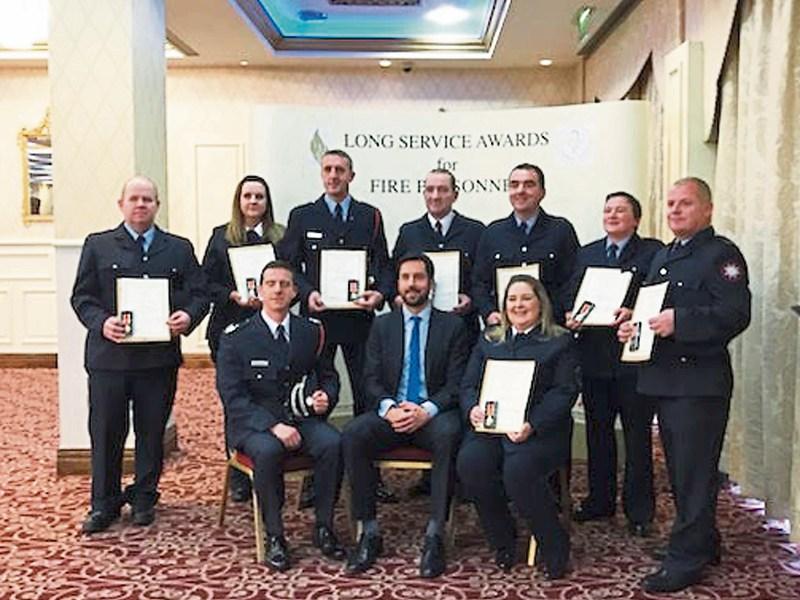 Minister Eoghan Murphy (front, centre) presented the long-service awards at a ceremony in Dublin