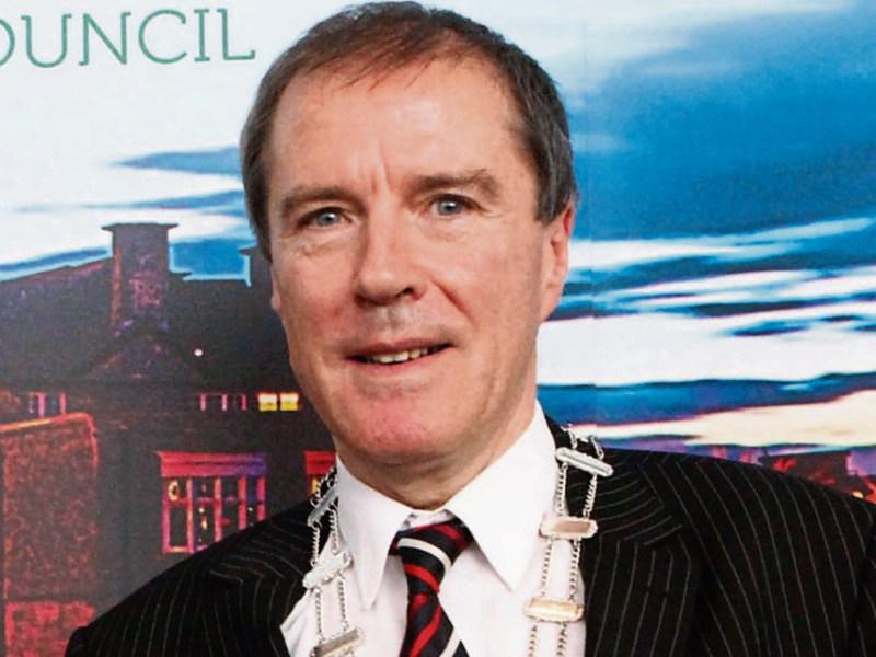 Cllr Gerald Mitchell has sought legal advice as a row over plans for the €2m roundabout rumbles on
