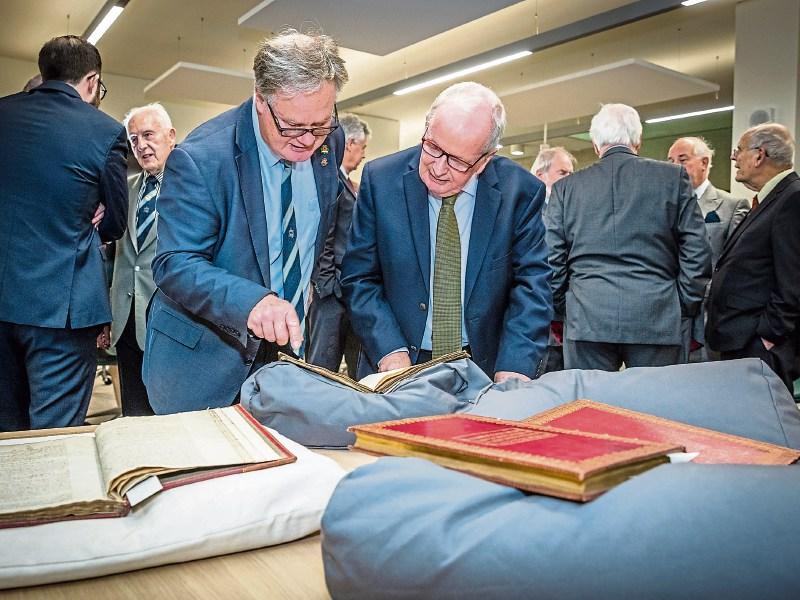 Edmund Pery, Earl of Limerick and Dr Des Fitzgerald, President of UL, looking over the papers Pictures: Keith Wiseman
