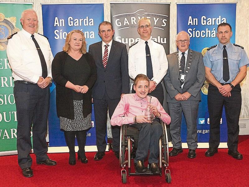 Chief Supt Gerard Roche presented a Limerick Garda Divisional Youth Award to Sean Byrnes, Scoil Na Tríonóide Naofa, Doon