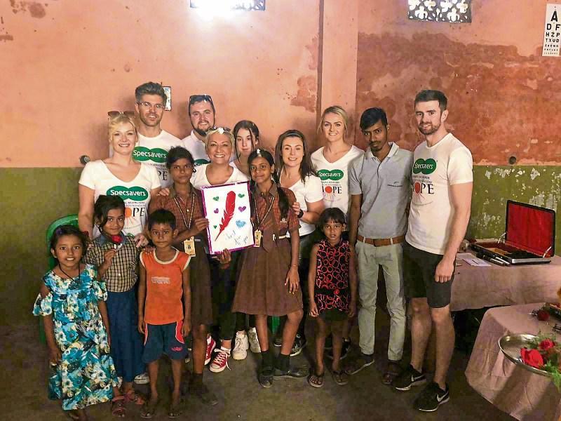 Sinead Clohessy and Shannon Power pictured with the patients of the mobile eye clinic with The Hope Foundation in Kolkata, India