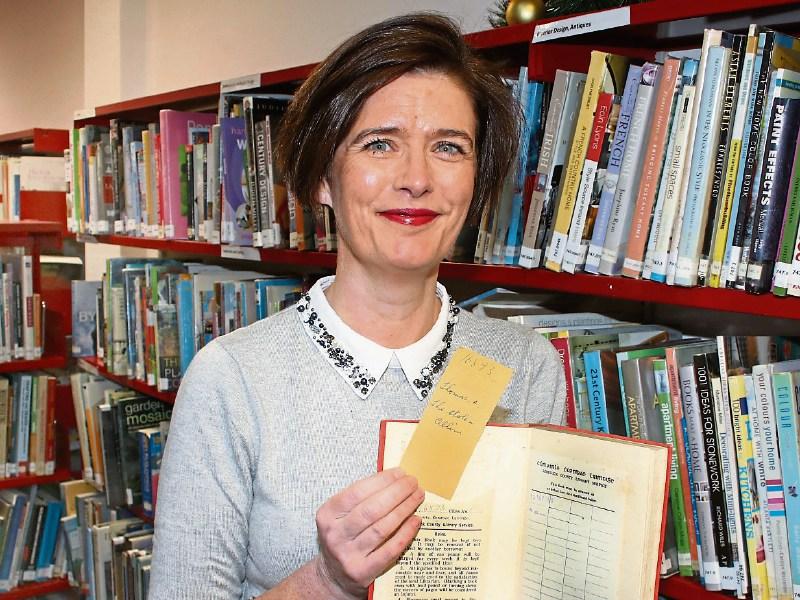 Librarian Marie Stakelum with the returned book Picture:Adrian Butler